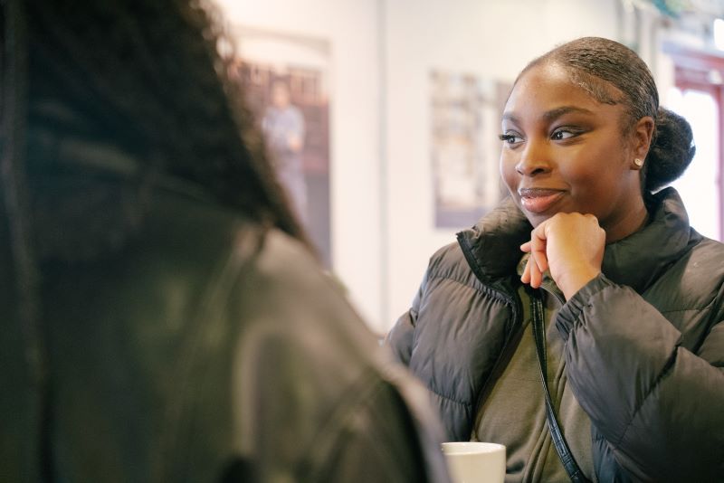 A girl smiles at the camera