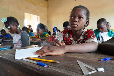 A school girl in her classroom