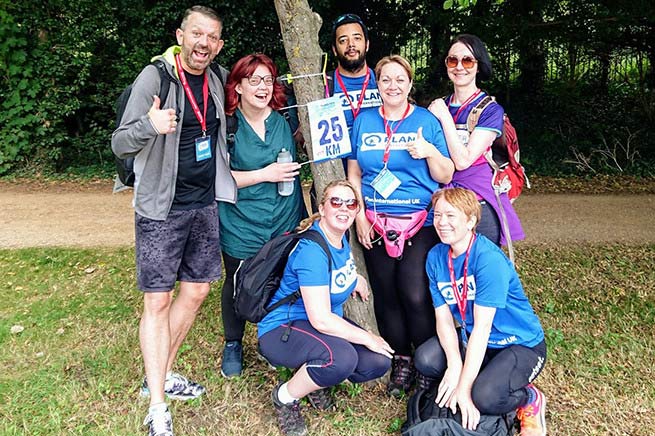 Kevin (far left) with Plan International UK's Thames Path Challenge team