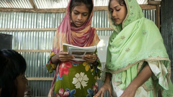 Tanzila teaches at an accelerated learning school, supported by Plan International