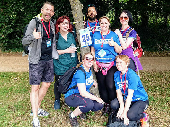 Kevin (far left) with Plan International UK's Thames Path Challenge team