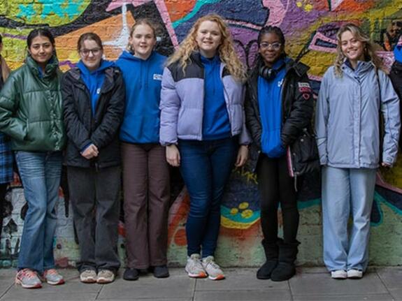 A group photo the Youth Advisory Panel standing in a line