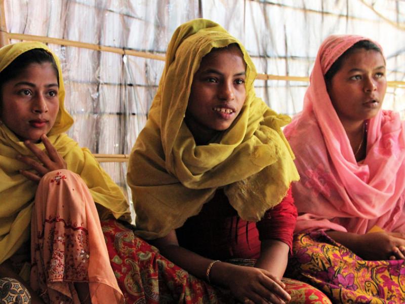 Rohingya girls take part in a menstrual health management session run by Plan International.