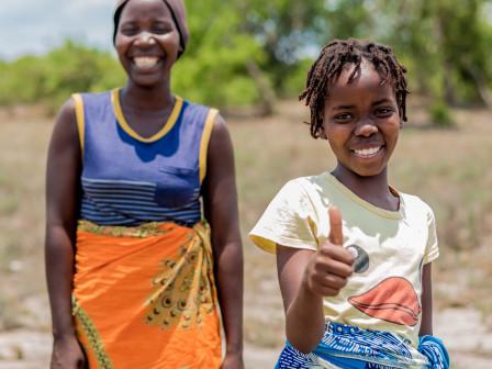 Two girls smiling